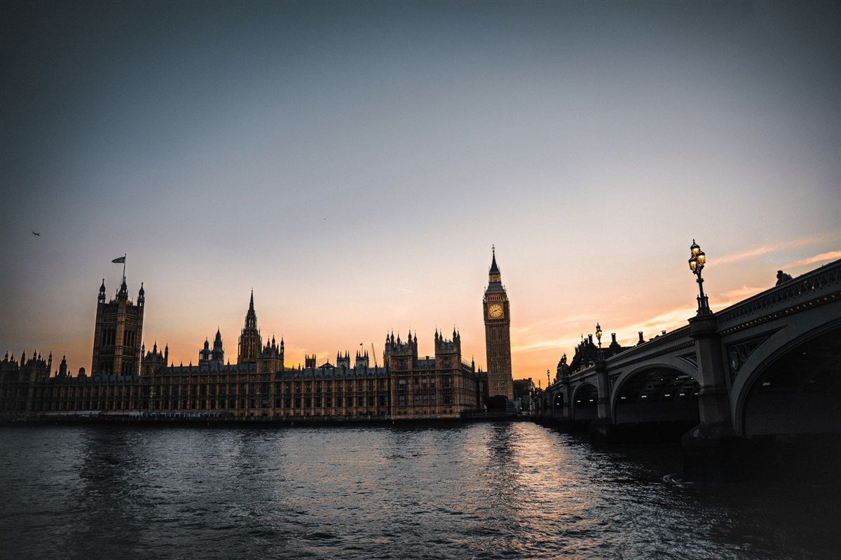 The Palace of Westminster and the River Thames in warm evening light